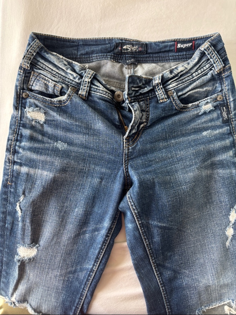 Silver Jeans Women's Faded Blue Distressed Skinny Jeans